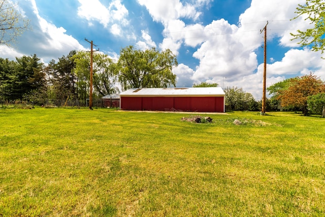 789 W Castle Rd, Fostoria, MI 48435 - view of yard featuring a pole building and an outdoor structure
