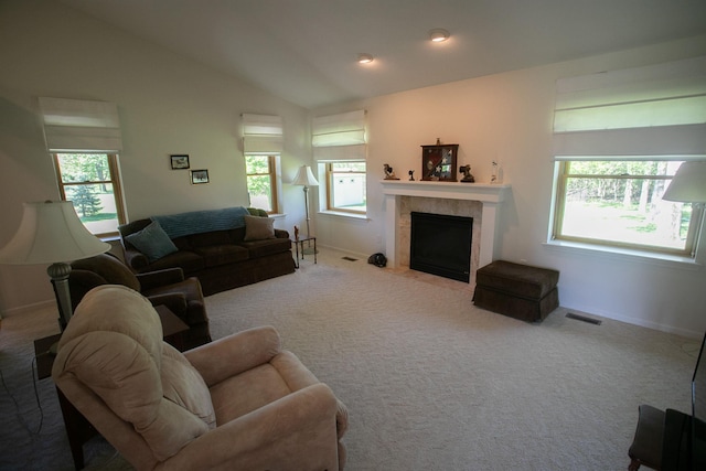 1820 Elk Ct, Owosso, MI 48867 - living room with a fireplace, vaulted ceiling, carpet, and baseboards