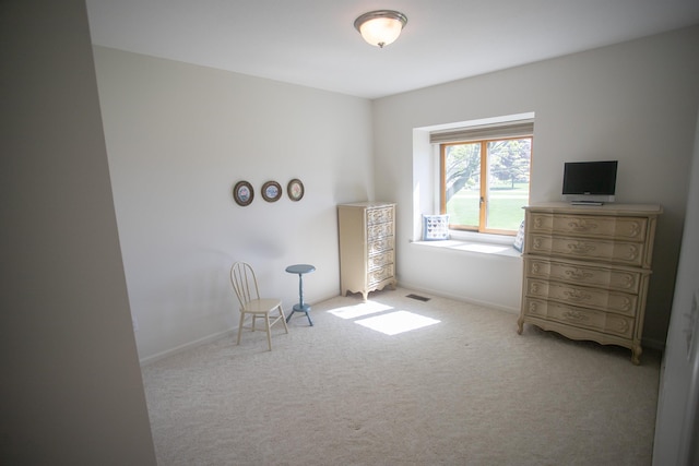 1820 Elk Ct, Owosso, MI 48867 - sitting room featuring carpet flooring and baseboards