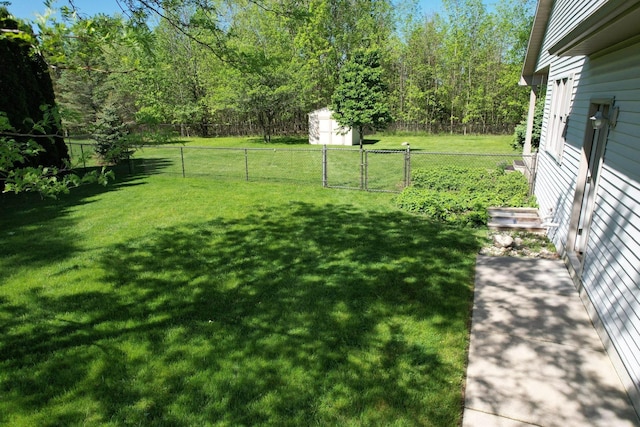 1820 Elk Ct, Owosso, MI 48867 - view of yard with a shed and an outdoor structure