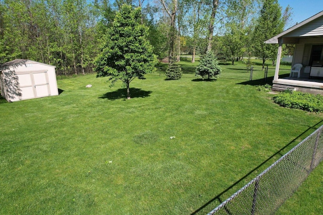 1820 Elk Ct, Owosso, MI 48867 - view of yard featuring a shed and an outbuilding