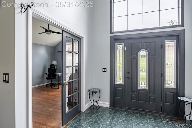 42739 Pond View Dr, Sterling Heights, MI 48314 - entryway featuring baseboards and a ceiling fan