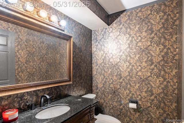 42739 Pond View Dr, Sterling Heights, MI 48314 - half bathroom featuring vanity, toilet, and decorative backsplash