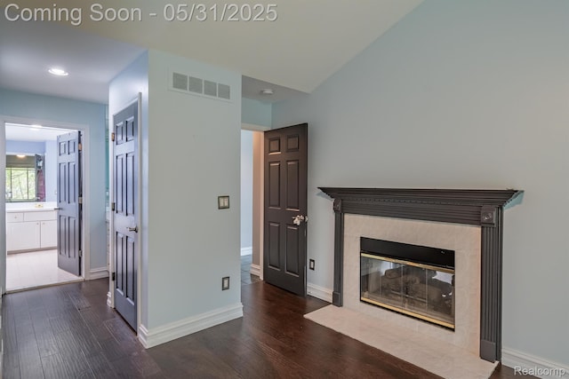42739 Pond View Dr, Sterling Heights, MI 48314 - unfurnished living room with wood finished floors, a high end fireplace, baseboards, and recessed lighting