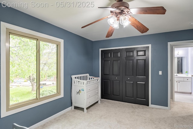 42739 Pond View Dr, Sterling Heights, MI 48314 - unfurnished bedroom with carpet floors, a closet, baseboards, and a ceiling fan