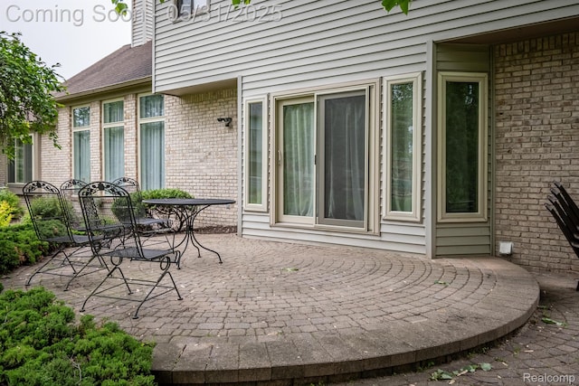 42739 Pond View Dr, Sterling Heights, MI 48314 - view of patio featuring outdoor dining space