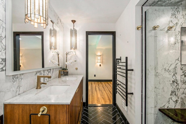 2315 Adare Rd, Ann Arbor, MI 48104 - full bathroom with a towel warmer and double vanity