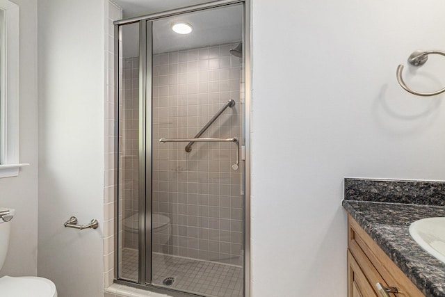 2315 Adare Rd, Ann Arbor, MI 48104 - full bath featuring a shower stall, toilet, and vanity