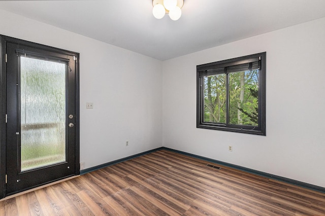 2315 Adare Rd, Ann Arbor, MI 48104 - spare room with wood finished floors and baseboards