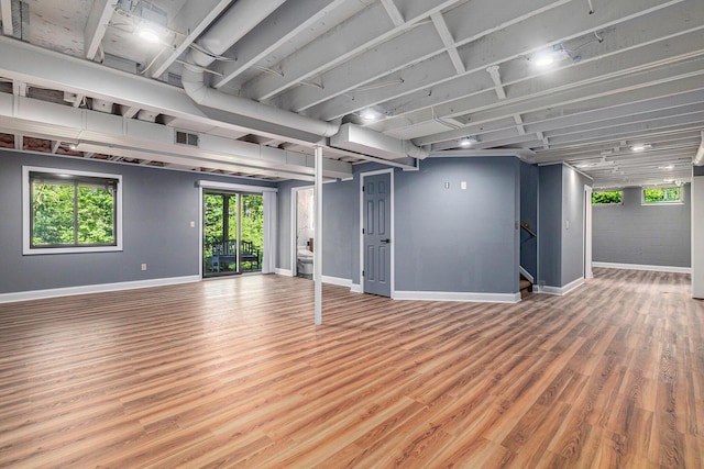 2315 Adare Rd, Ann Arbor, MI 48104 - basement featuring baseboards and wood finished floors