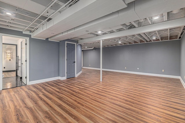 2315 Adare Rd, Ann Arbor, MI 48104 - finished basement featuring wood finished floors and baseboards