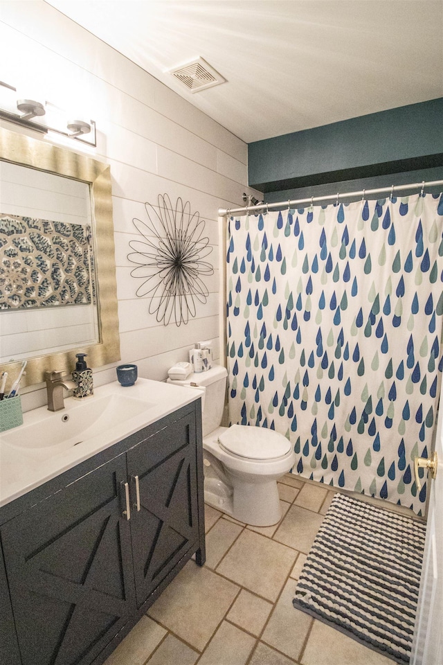 5221 Whittaker Trl, Linden, MI 48451 - full bath featuring toilet, vanity, a shower with shower curtain, and wood walls