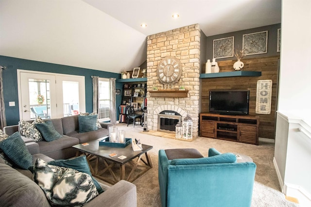 5221 Whittaker Trl, Linden, MI 48451 - carpeted living area featuring a stone fireplace and vaulted ceiling