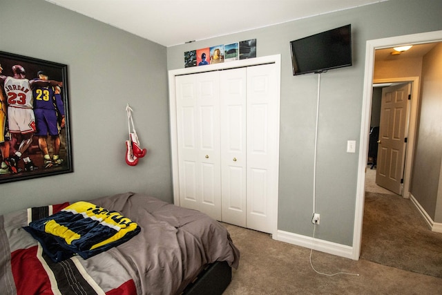 5221 Whittaker Trl, Linden, MI 48451 - bedroom featuring carpet, baseboards, and a closet