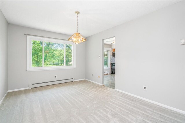 7045 Crane Rd, Ypsilanti, MI 48197 - carpeted empty room featuring a baseboard radiator, a chandelier, and baseboards