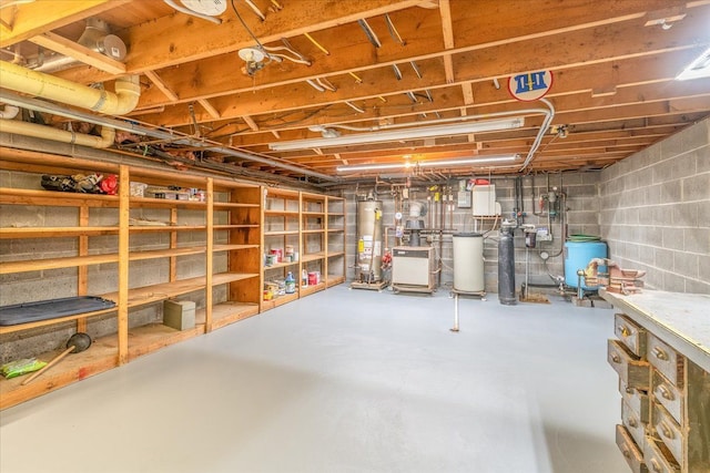 7045 Crane Rd, Ypsilanti, MI 48197 - unfinished below grade area featuring gas water heater, a heating unit, and a water pressure tank