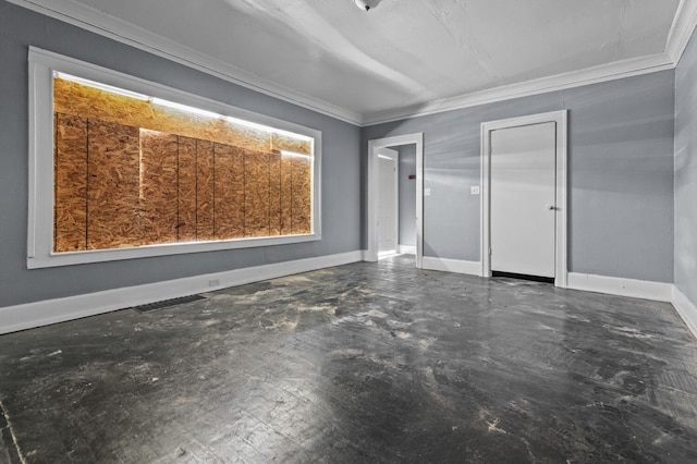 3779 Gladstone St, Detroit, MI 48206 - spare room with crown molding, concrete flooring, and baseboards