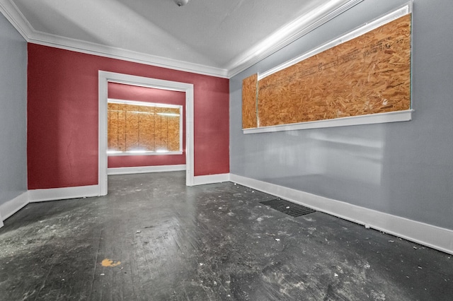 3779 Gladstone St, Detroit, MI 48206 - spare room featuring baseboards, ornamental molding, and concrete floors