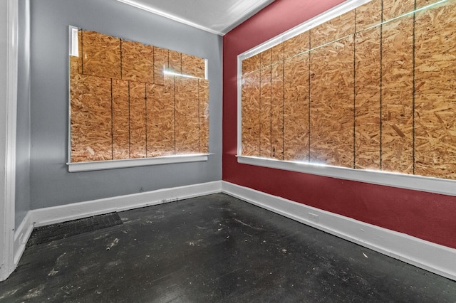 3779 Gladstone St, Detroit, MI 48206 - empty room featuring concrete floors and baseboards