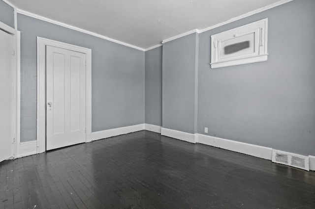 3779 Gladstone St, Detroit, MI 48206 - spare room featuring ornamental molding, dark wood-type flooring, and baseboards