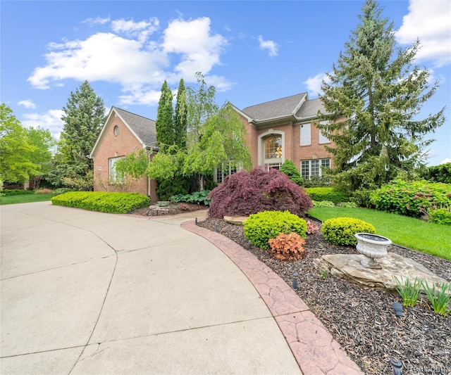 17747 Parkshore Dr, Northville, MI 48168 - view of front of house with brick siding