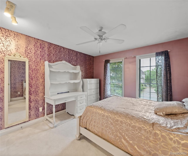 17747 Parkshore Dr, Northville, MI 48168 - bedroom featuring carpet flooring, wallpapered walls, a ceiling fan, and baseboards