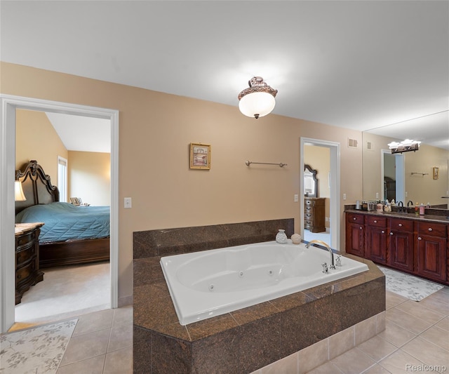 17747 Parkshore Dr, Northville, MI 48168 - ensuite bathroom featuring double vanity, a jetted tub, and tile patterned floors