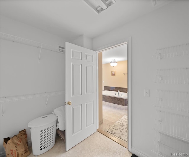 17747 Parkshore Dr, Northville, MI 48168 - bathroom featuring a tub to relax in