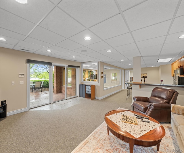 17747 Parkshore Dr, Northville, MI 48168 - living room featuring bar, light colored carpet, baseboards, a paneled ceiling, and recessed lighting