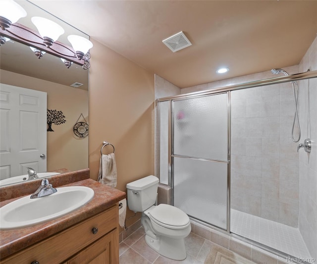 17747 Parkshore Dr, Northville, MI 48168 - full bathroom with toilet, a shower stall, vanity, tile patterned floors, and a chandelier