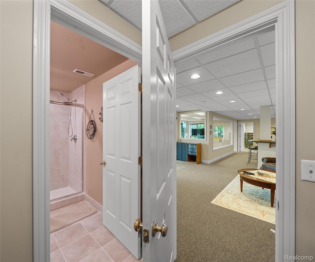 17747 Parkshore Dr, Northville, MI 48168 - hall with recessed lighting, baseboards, carpet floors, and tile patterned flooring
