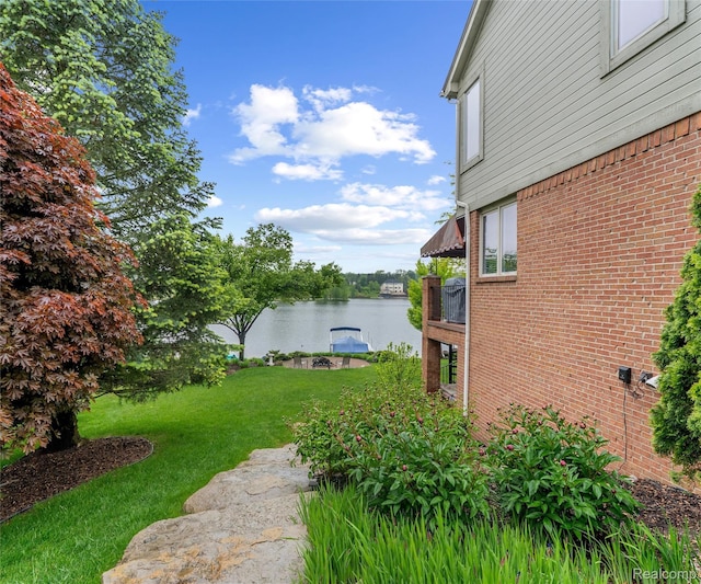 17747 Parkshore Dr, Northville, MI 48168 - view of green lawn with a water view