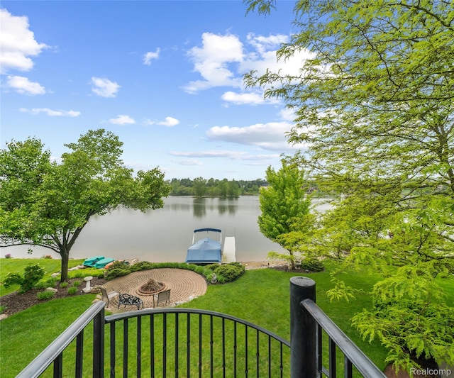 17747 Parkshore Dr, Northville, MI 48168 - water view with an outdoor fire pit and a dock