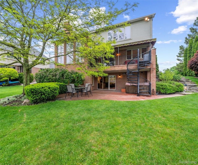 17747 Parkshore Dr, Northville, MI 48168 - rear view of property with a patio, a lawn, brick siding, and stairs