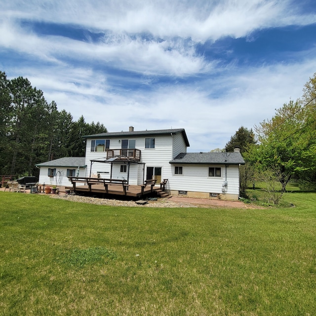 400 E Schafer Rd, Pinckney, MI 48169 - back of house featuring a deck, a chimney, and a yard