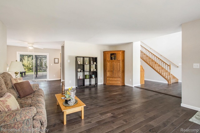 400 E Schafer Rd, Pinckney, MI 48169 - living room featuring stairs, dark wood-style flooring, and a ceiling fan