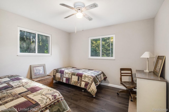 400 E Schafer Rd, Pinckney, MI 48169 - bedroom featuring dark wood finished floors and ceiling fan