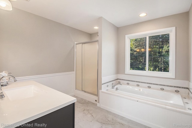 400 E Schafer Rd, Pinckney, MI 48169 - bathroom featuring marble look tiles, a bath, a stall shower, vanity, and recessed lighting