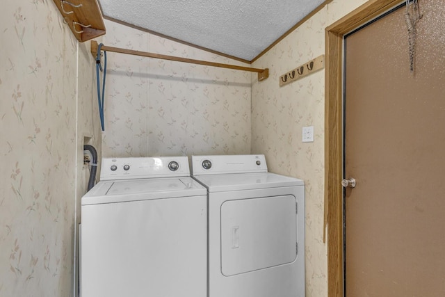 3749 Wellman Rd, Parma, MI 49269 - laundry room featuring independent washer and dryer, wallpapered walls, and a textured ceiling