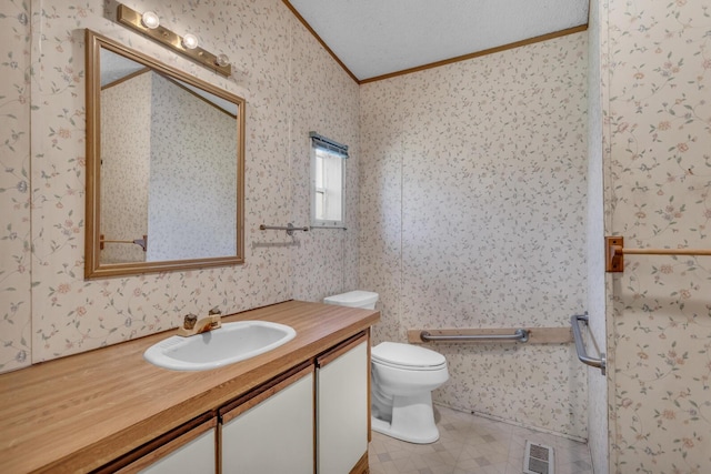 3749 Wellman Rd, Parma, MI 49269 - bathroom featuring crown molding, tile patterned floors, vanity, and toilet