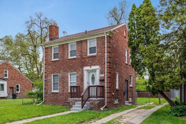 15770 Mansfield St, Detroit, MI 48227 - view of front facade featuring a chimney and brick siding