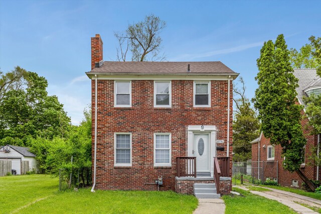 15770 Mansfield St, Detroit, MI 48227 - view of front of property with a chimney and brick siding