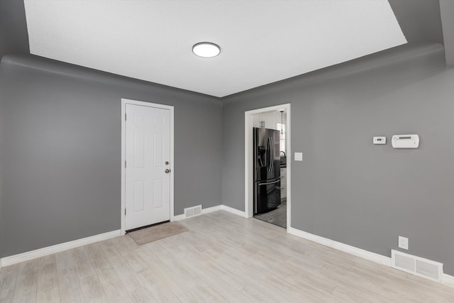 15770 Mansfield St, Detroit, MI 48227 - entrance foyer with light wood finished floors and baseboards