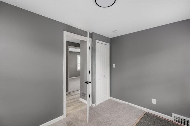 15770 Mansfield St, Detroit, MI 48227 - unfurnished bedroom featuring carpet, baseboards, and a closet