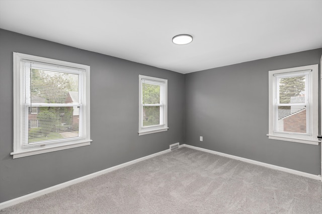 15770 Mansfield St, Detroit, MI 48227 - empty room featuring carpet floors and baseboards