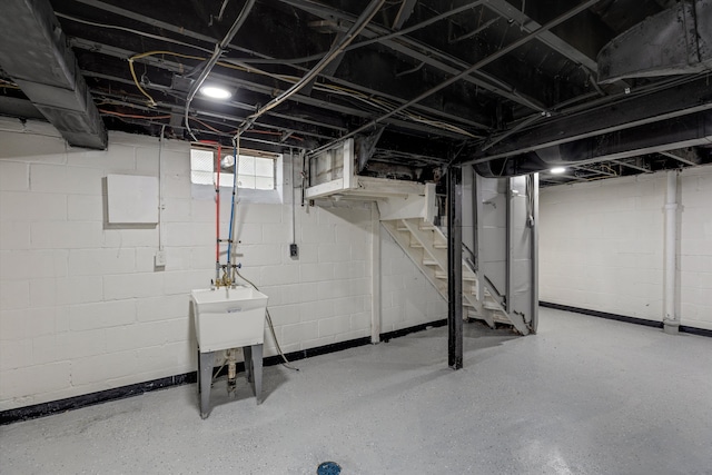 15770 Mansfield St, Detroit, MI 48227 - basement featuring stairs and a sink
