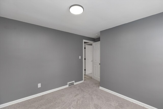 15770 Mansfield St, Detroit, MI 48227 - empty room featuring baseboards and light carpet