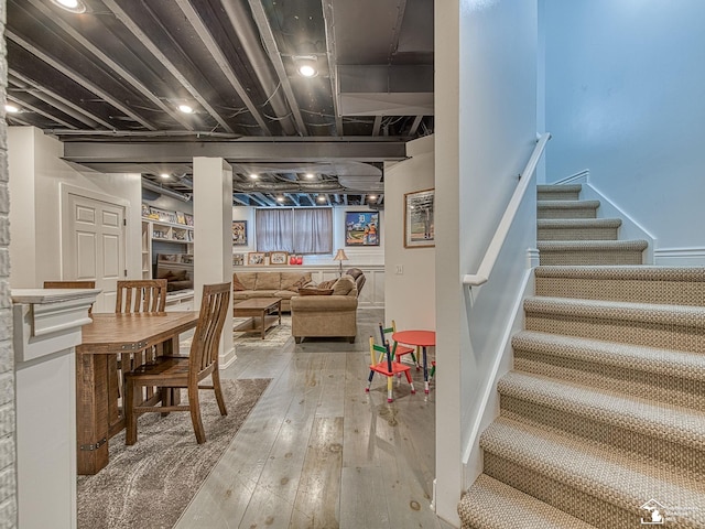 469 Corinth Cir, Dundee, MI 48131 - finished basement featuring stairs and hardwood / wood-style flooring