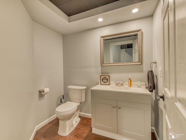 469 Corinth Cir, Dundee, MI 48131 - half bath with toilet, wood finished floors, baseboards, vanity, and recessed lighting