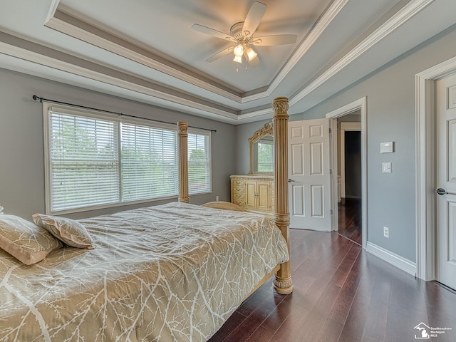 469 Corinth Cir, Dundee, MI 48131 - bedroom featuring a raised ceiling, crown molding, dark wood finished floors, baseboards, and ceiling fan